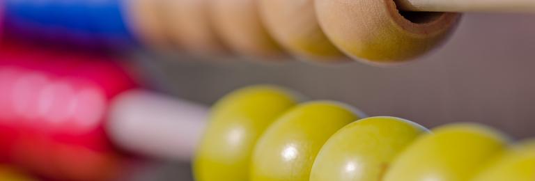 A close up picture of an abacus.